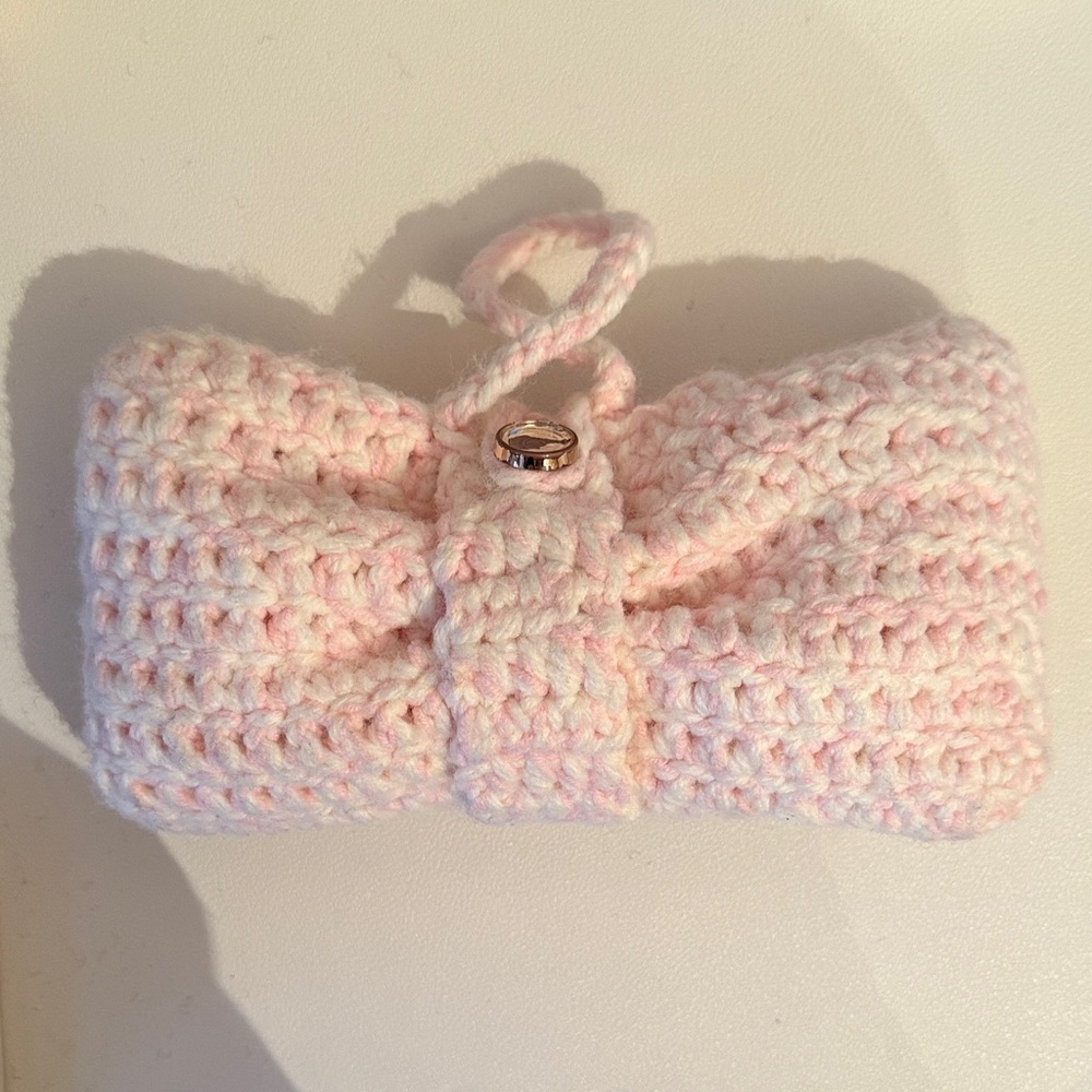 Pink crocheted bow pouch handmade
